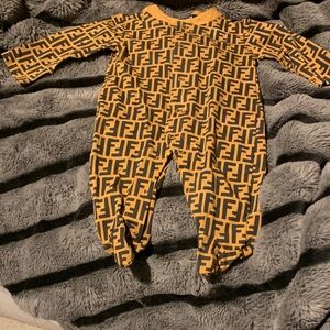 #584 NWOT “Fendi” Kids Bold Orange and Black Footie
